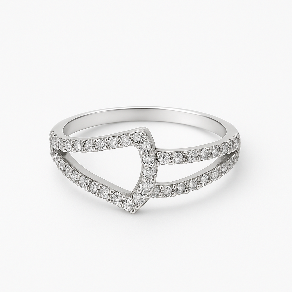 Sterling silver V-shaped ring encrusted with micro-pavé cubic zirconia stones on white background